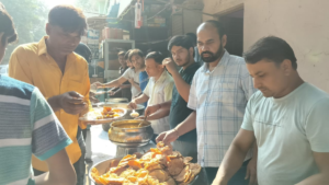 Distribution of food to the needy