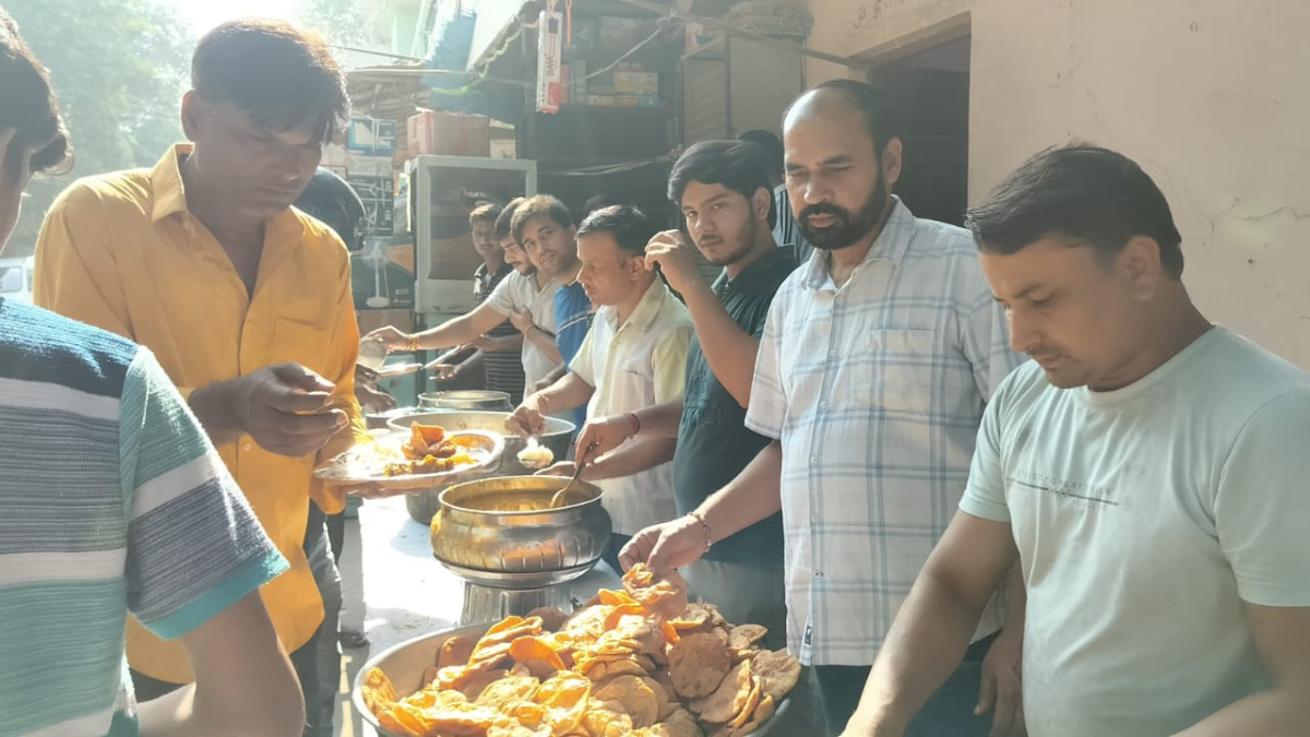 Distribution of food to the needy